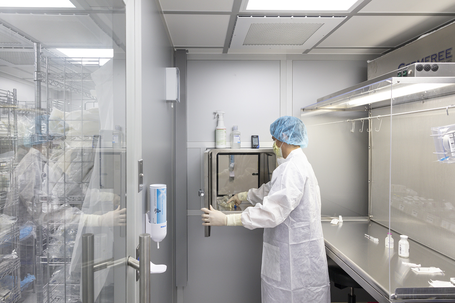 Employee placing drugs in the Qlenaspace Pass-through